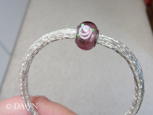 The silver wire chain, once through the smallest drawplate hole, is small enough for a Pandora-style glass bead!