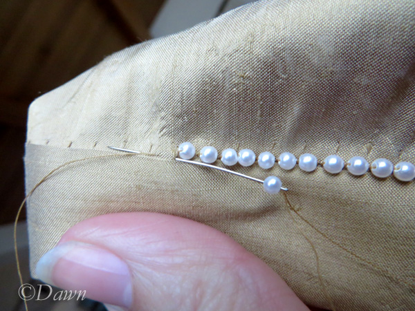 Sewing pearls on