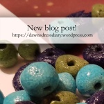 Turquoise, green, and dark blue/purple Faience beads