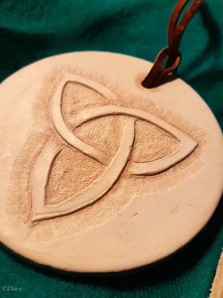Leather ornament made at Borealis Yule 2018